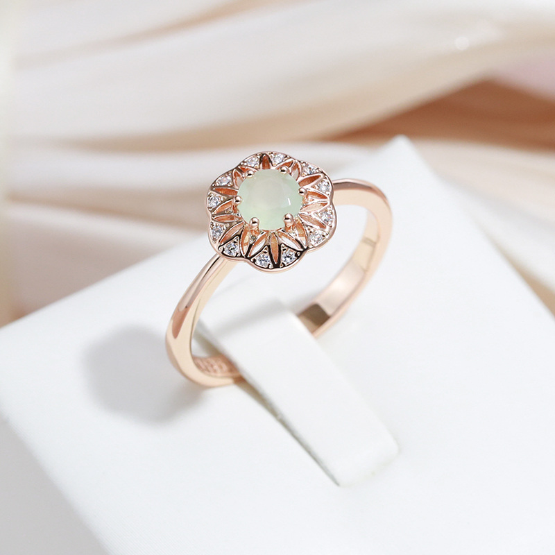 Elegant Ring with Green Crystal in the Bell