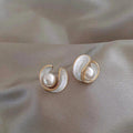 Luxurious Earrings with White Opal and Pearl in Gold
