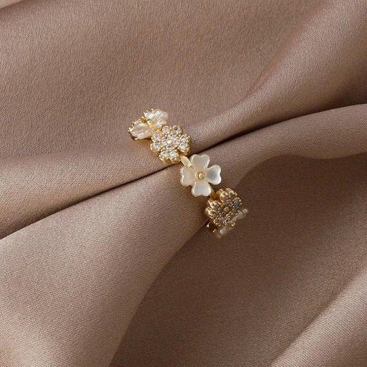 Adjustable Gold Ring with White Flowers and Zirconia