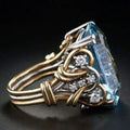 Gold Ring with Blue Zircon in Vintage Style