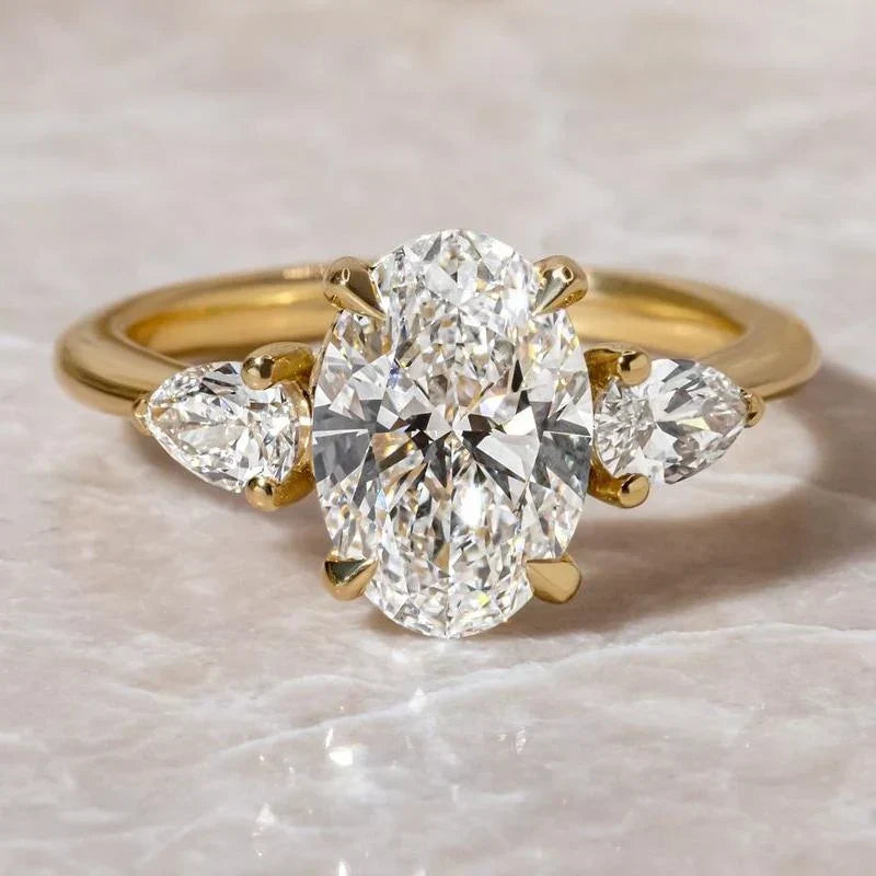 Oval Cut Three Stone Engagement Ring