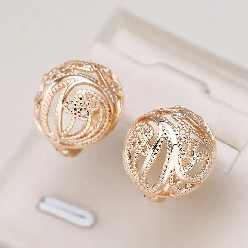 Elegant Hollow Ball Earrings in Gold